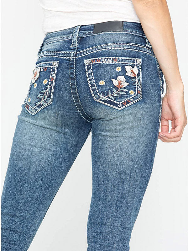 Washed Distressed Floral Embroidered Mid Rise Elastic Bootcut Jeans